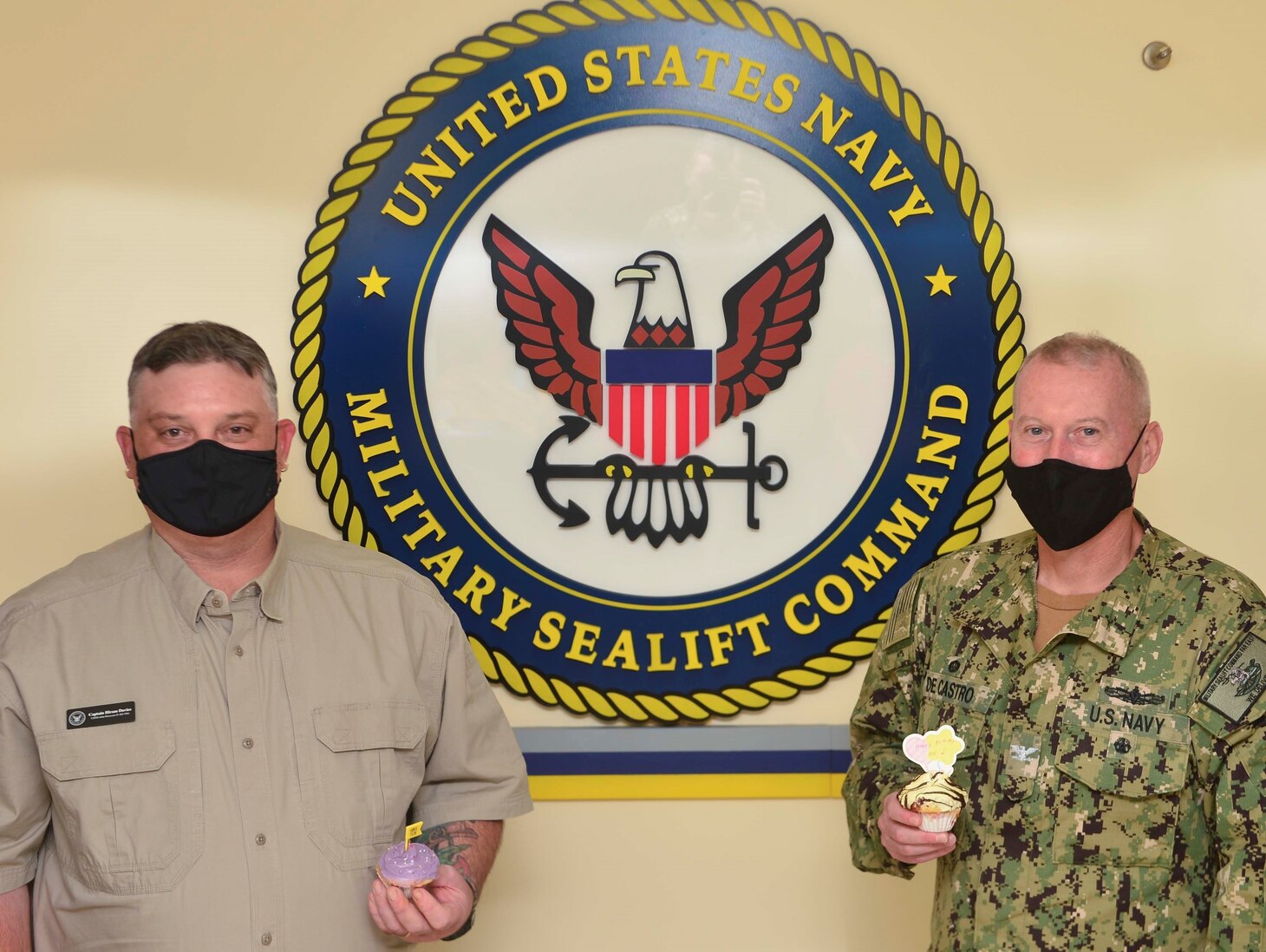 210709-N-UA460-001 SINGAPORE (July 9, 2021) From left, Capt. Hiram D. Davies, master of USNS John Ericsson (T-AO 194), and Capt. Samuel F. de Castro, commodore, Military Sealift Command Far East, recognize MSC’s birthday on July 9. MSC Far East ensures approximately 50 ships in the Indo-Pacific region, are manned, trained and equipped to deliver essential supplies, fuel, cargo, and equipment to warfighters, both at sea and on shore. Task force commanders employ these ships to ensure mission accomplishment. COMLOG WESTPAC/CTF 73 is the U.S. 7th Fleet's provider of combat-ready logistics, operating government-owned and contracted ships that keep units throughout 7th Fleet armed, fueled and fed. As the U.S. Navy's largest forward-deployed fleet, 7th Fleet employs 50-70 ships and submarines across the Western Pacific and Indian oceans. U.S. 7th Fleet routinely operates and interacts with 35 maritime nations while conducting missions to preserve and protect a free and open Indo-Pacific Region. Military Sealift Command is the leading provider of ocean transportation for the Navy and the rest of the Department of Defense - operating approximately 125 ships daily around the globe. (U.S. Navy photo by Mass Communication  Specialist 1st Class Gregory Johnson)