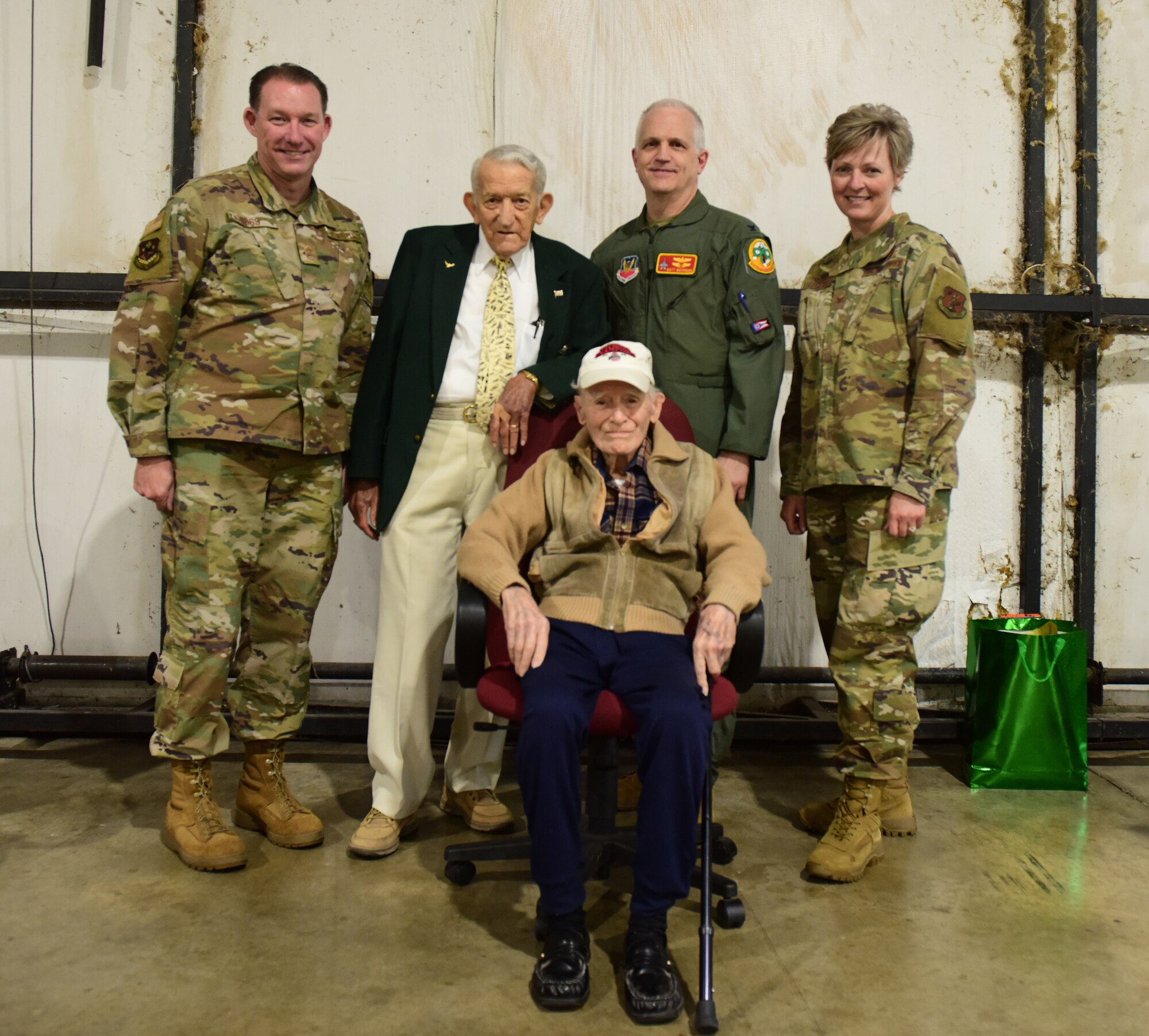 U.S. Air Force Lt. Col. (retired) Darrell Larkin poses for a group portrait with: (from left) Chief Master Sgt. Scott Ross, Maj. Gen. retired Ray Moorman, Col. Matt Moorman, and 178th Wing Commander Col. Kim Fitzgerald May 8, 2021 at the Highland County Airport, Hillsboro, Ohio. Larkin retired from the Ohio Air National Guard as a Lt. Col. before rejoining years later to retire a second time as an Ohio Air National Guard Tech. Sgt. (Air National Guard photo by Airman Jillian Maynus)