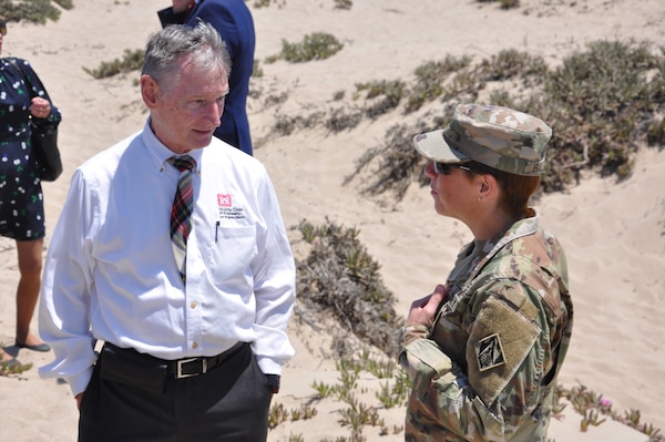 U.S. Army Corps of Engineers Los Angeles District Supervisory Civil Engineer Steve Dwyer and commander Col. Julie Balten discuss projects, June 29, 2021, at Ventura Beach, California. Ventura Harbor District is partnered with the Corps to maintain the busy harbor.