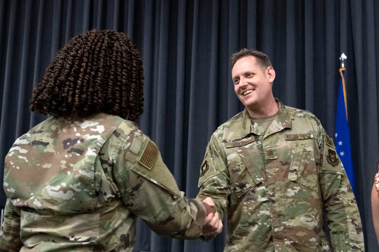 Photo of Airmen shaking hands