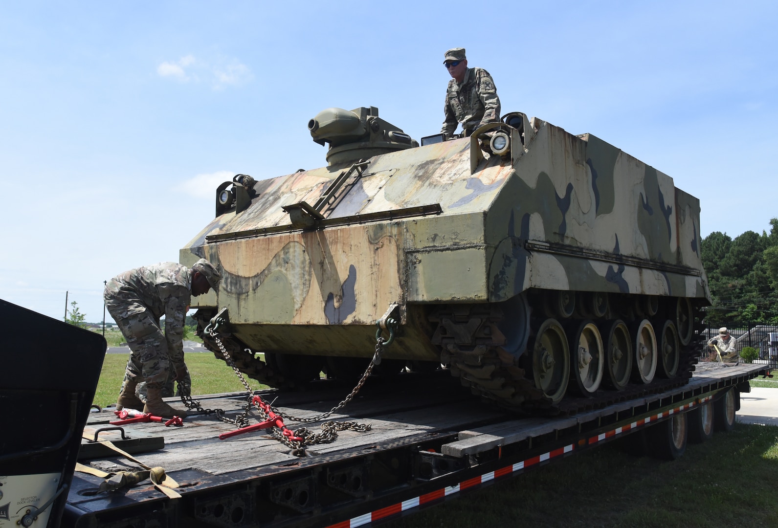 Virginia National Guard Soldiers assigned to the G4 Maintenance Assistance and Instruction Team offload an M84 self-propelled 4.2 mortar carrier June 25, 2021, at the VNG's Sergeant Bob Slaughter Headquarters at Defense Supply Center Richmond, Virginia.