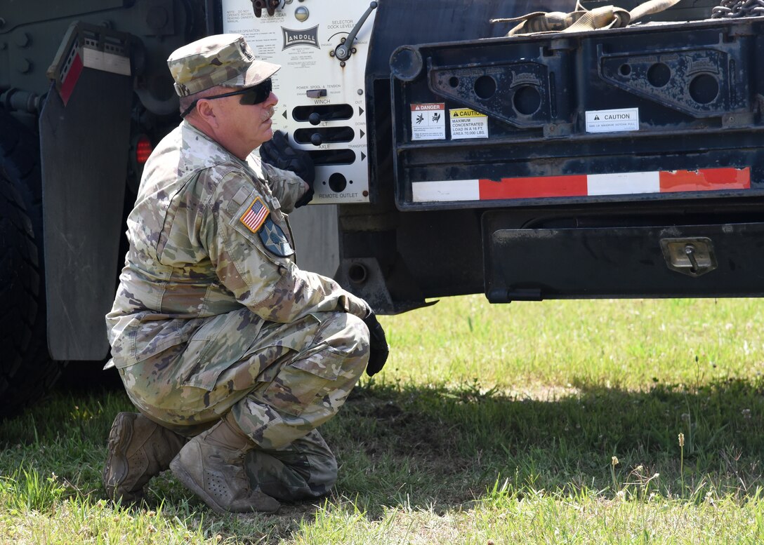 Virginia National Guard Soldiers assigned to the G4 Maintenance Assistance and Instruction Team offload an M84 self-propelled 4.2 mortar carrier June 25, 2021, at the VNG's Sergeant Bob Slaughter Headquarters at Defense Supply Center Richmond, Virginia.