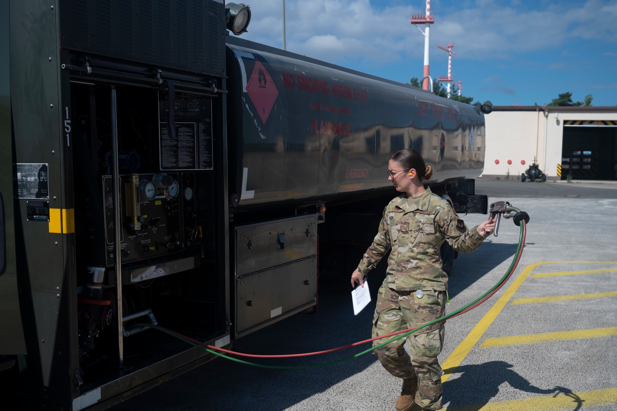 U.S. Air Force Airman Lindsey Ford, 86th Logistics Readiness Squadron fuels distribution operator, conducts an inspection of a fuel hose