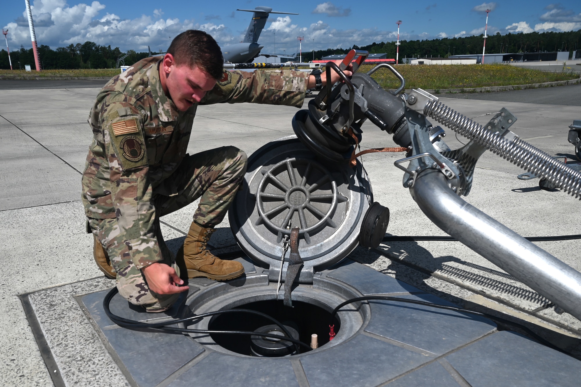 U.S. Air Force Senior Airman Brett Morton, 86th Logistics Readiness Squadron fuels facilities operator, inspects a fuel hydrant coupler