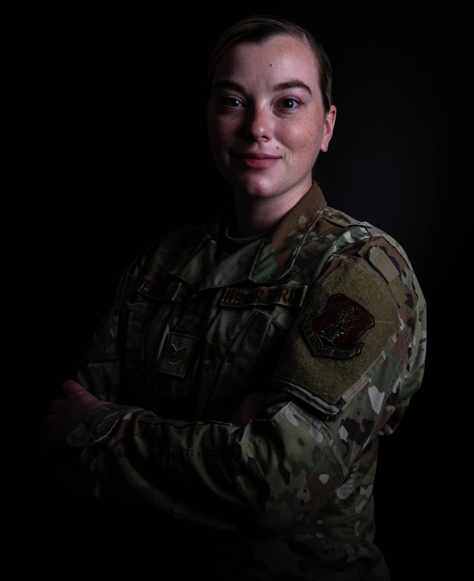 An Airman poses for a photo.