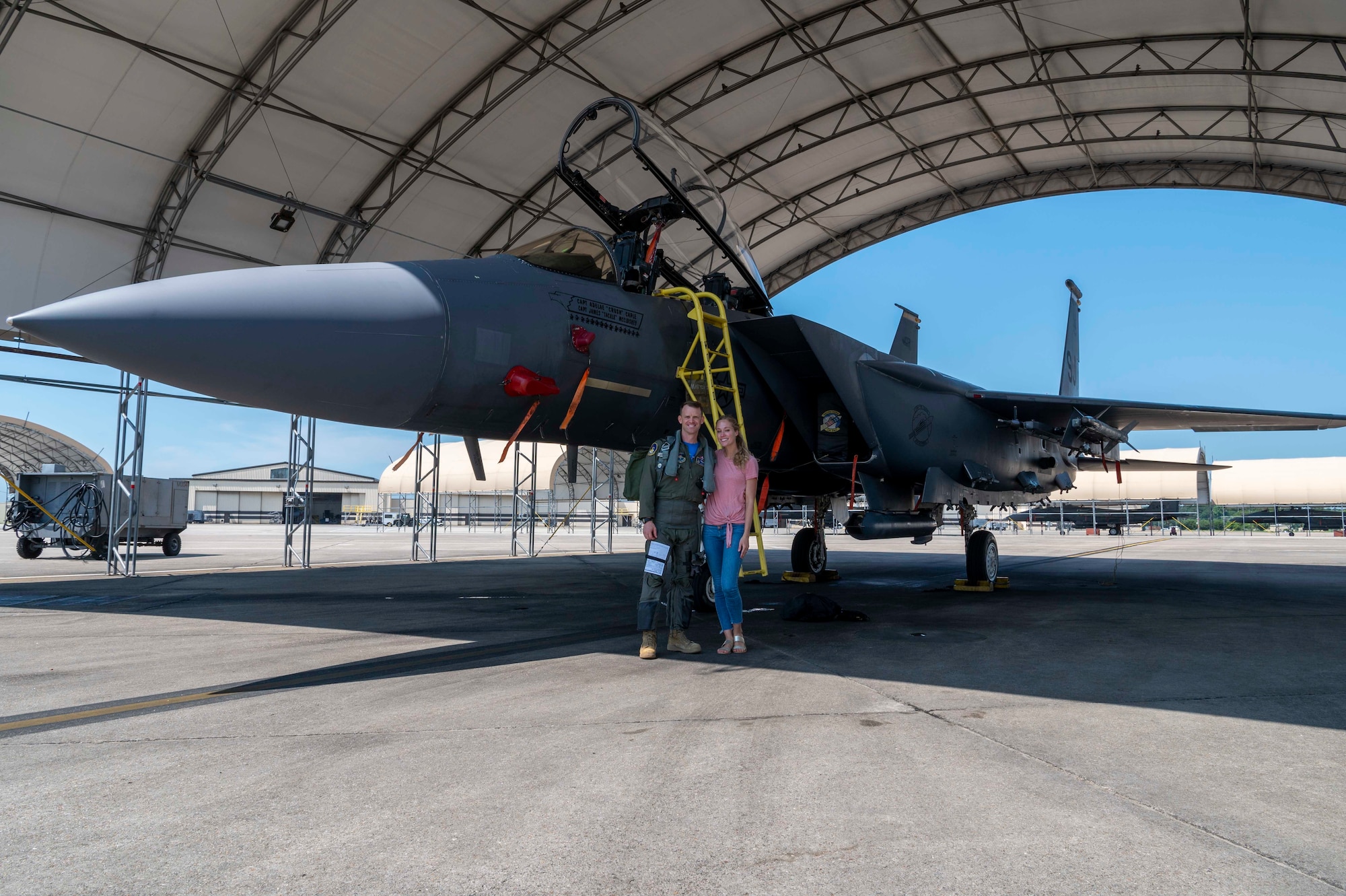 Maj. David Hook, 50th Flying Training Squadron instructor pilot, and his wife, Kelly, pose for a photo at Seymour Johnson Air Force Base, North Carolina, July 9, 2021.