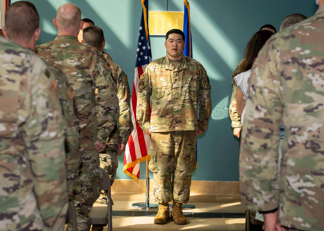 Maj. Samuel Han, 4th Comptroller Squadron commander, sings the Air Force song during the 4th CPTS change of command ceremony at Seymour Johnson Air Force Base, North Carolina, July 9, 2021.