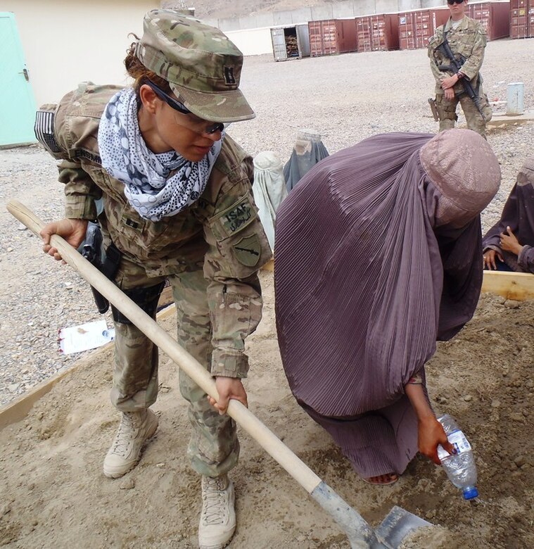 While the children's mothers trained on various agriculture aspects and Afghan laws pertaining to women, their children received organized education and school supplies with help from ADT 4