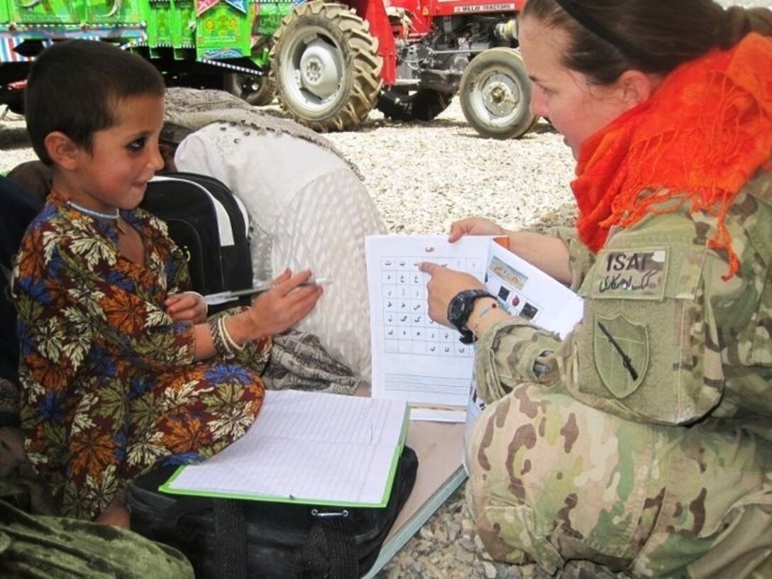 While the children's mothers trained on various agriculture aspects and Afghan laws pertaining to women, their children received organized education and school supplies with help from ADT 4