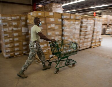 Soldier moves supplies at Strategic National Stockpile Warehouse