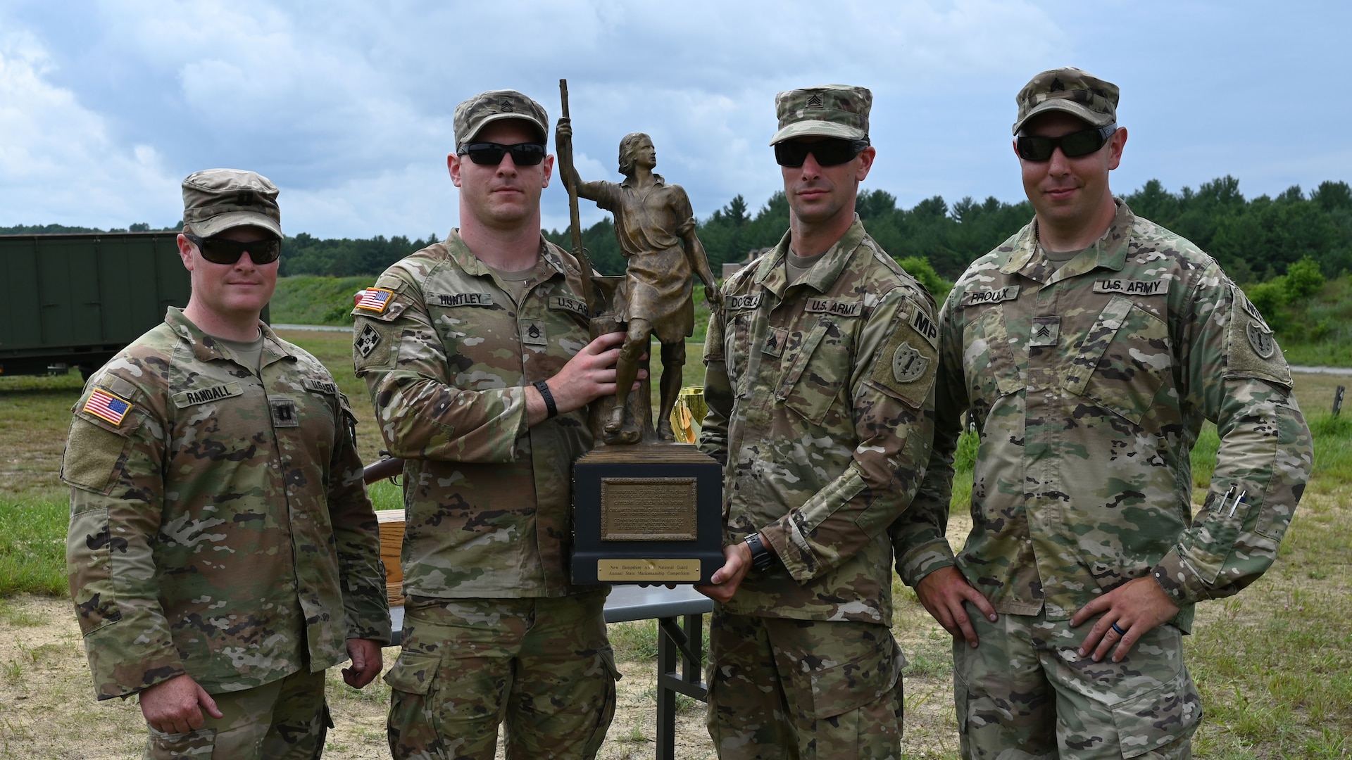 The Other Guys pose with the Remington Centennial Trophy after winning the adjutant general's annual combat marksmanship "TAG match" held July 8 - 11, 2021,at Fort Devens, Mass.