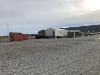 A former Federal Scout Readiness Center, built during the Cold War, resides in Gambell, Alaska, Aug. 5, 2020. The Alaska Army National Guard Divestiture Program donated the building to Sivuqaq Incorporated May 17, 2021, where the St. Lawrence Island community will continue using it as a search and rescue operations headquarters.