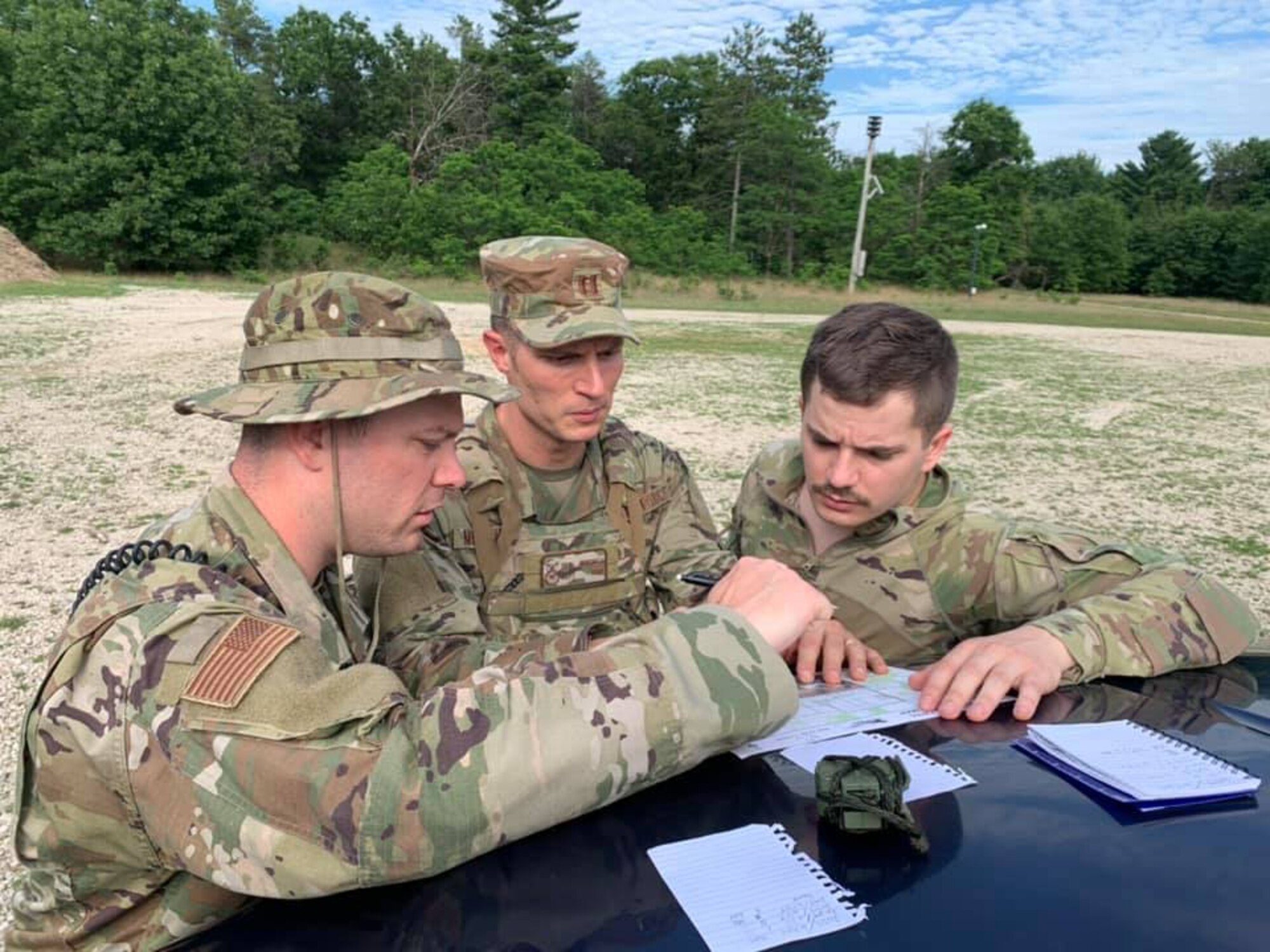 Airmen assigned to the Ohio Air National Guard's 178th Wing Security Forces Squadron conducted wartime skills training at the Volk Field Combat Regional Training Center, Wisc. from June 23-July 2 to enhance their air base ground defense skills. The Airmen improved many of their tactics and marksmanship skills using long range distance targets, land navigation, night operations, dismounted patrolling, tactical combat casualty care, and leadership development. (Photo provided)