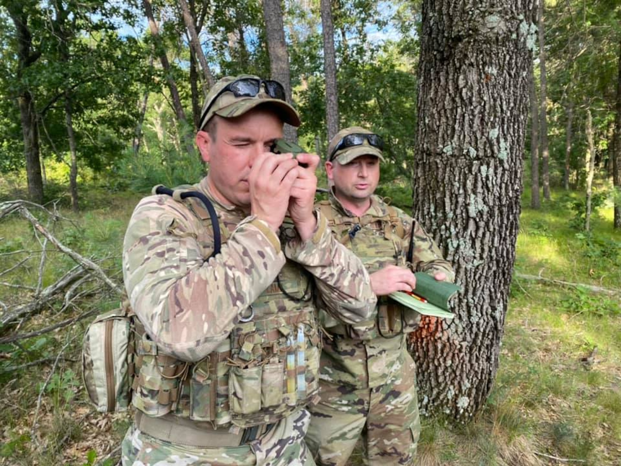 Airmen assigned to the Ohio Air National Guard's 178th Wing Security Forces Squadron conducted wartime skills training at the Volk Field Combat Regional Training Center, Wisc. from June 23-July 2 to enhance their air base ground defense skills. The Airmen improved many of their tactics and marksmanship skills using long range distance targets, land navigation, night operations, dismounted patrolling, tactical combat casualty care, and leadership development. (Photo provided)