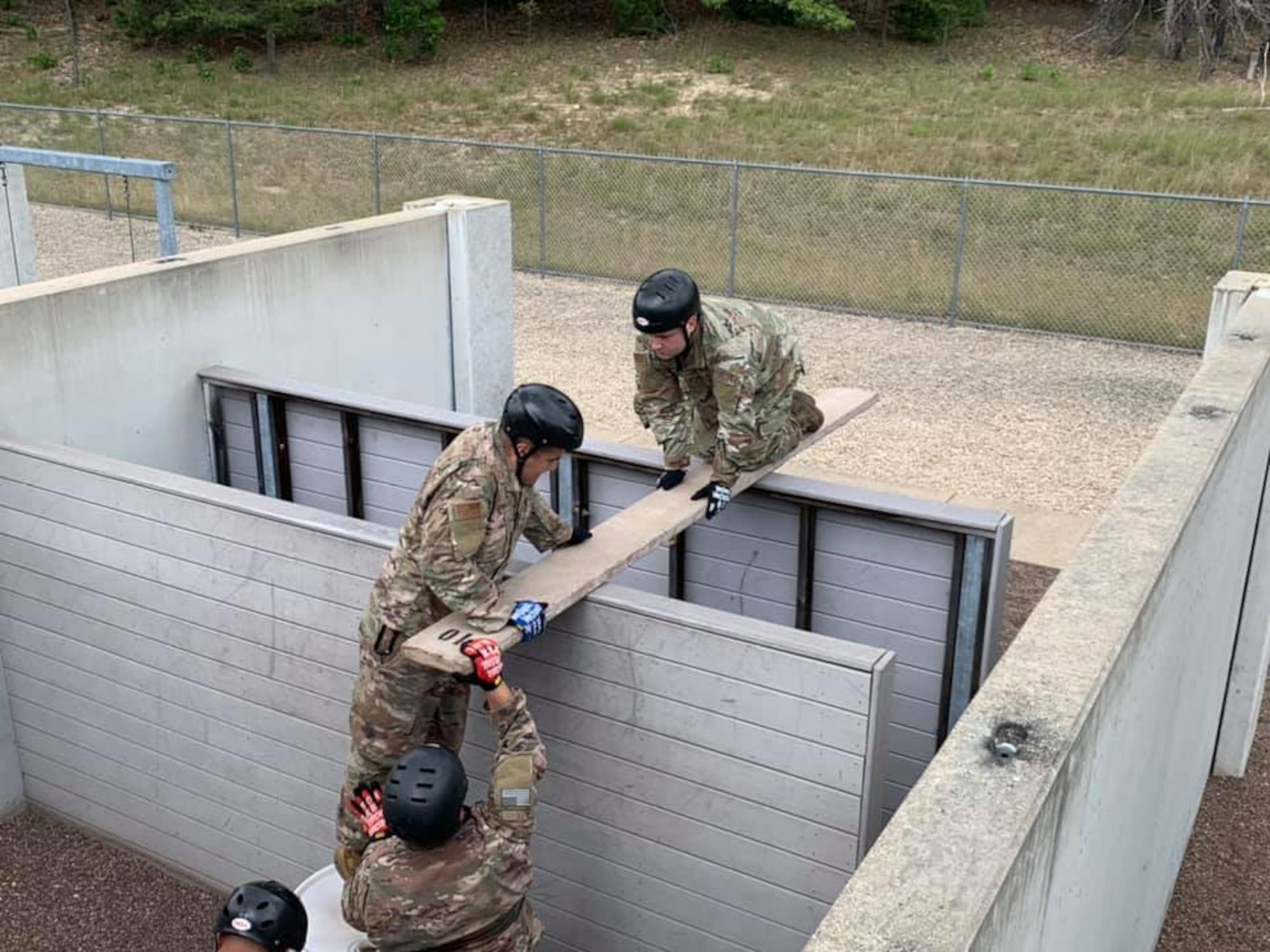 Airmen assigned to the Ohio Air National Guard's 178th Wing Security Forces Squadron conducted wartime skills training at the Volk Field Combat Regional Training Center, Wisc. from June 23-July 2 to enhance their air base ground defense skills. The Airmen improved many of their tactics and marksmanship skills using long range distance targets, land navigation, night operations, dismounted patrolling, tactical combat casualty care, and leadership development. (Photo provided)