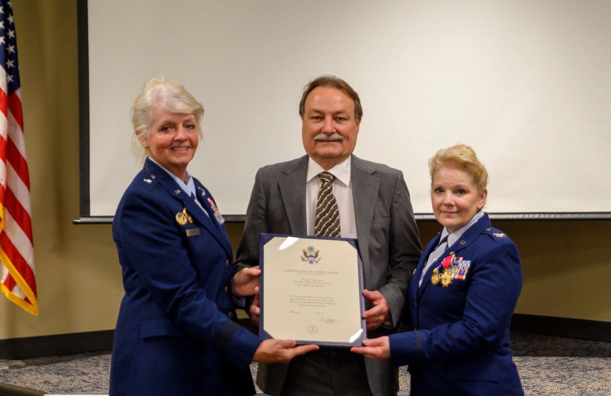 Col. Gardner displays her official retirement annoucment.