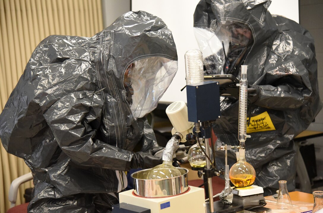 Virginia National Guard Soldiers and Airmen assigned to the Fort Pickett-based 34th Civil Support Team conduct a site assessment on a mock drug lab during a training exercise June 24, 2021, at the Manassas Readiness Center in Manassas, Virginia.