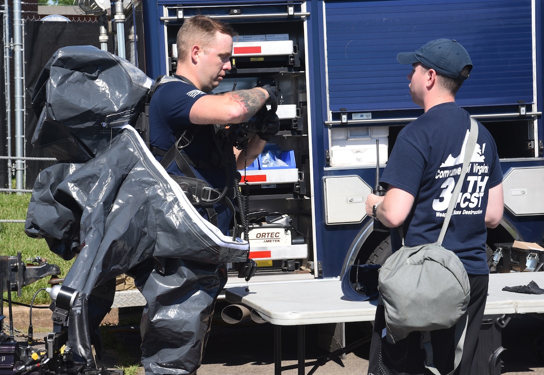 Virginia National Guard Soldiers and Airmen assigned to the Fort Pickett-based 34th Civil Support Team conduct a site assessment on a mock drug lab during a training exercise June 24, 2021, at the Manassas Readiness Center in Manassas, Virginia.