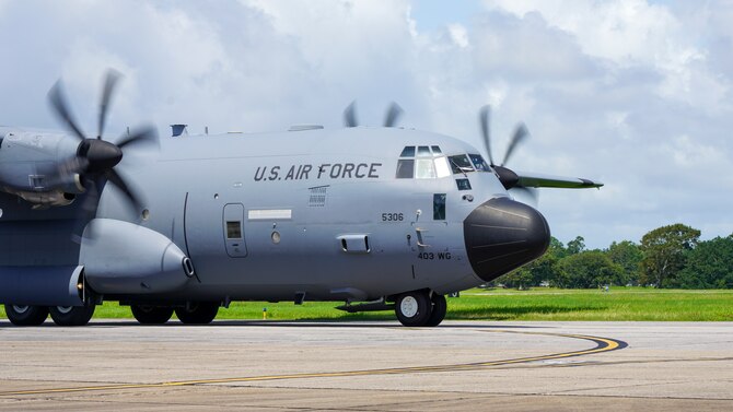 A WC-130J Super Hercules aircraft assigned to the 53rd Weather Reconnaissance Squadron at Keesler Air Force Base, Miss., taxis prior to its functional check flight July 13, 2021. This particular aircraft took off after months of extensive repairs to its wing caused by a fire that left a basketball-sized hole in the wing. (U.S. Air Force photo by 2nd Lt. Christopher Carranza)