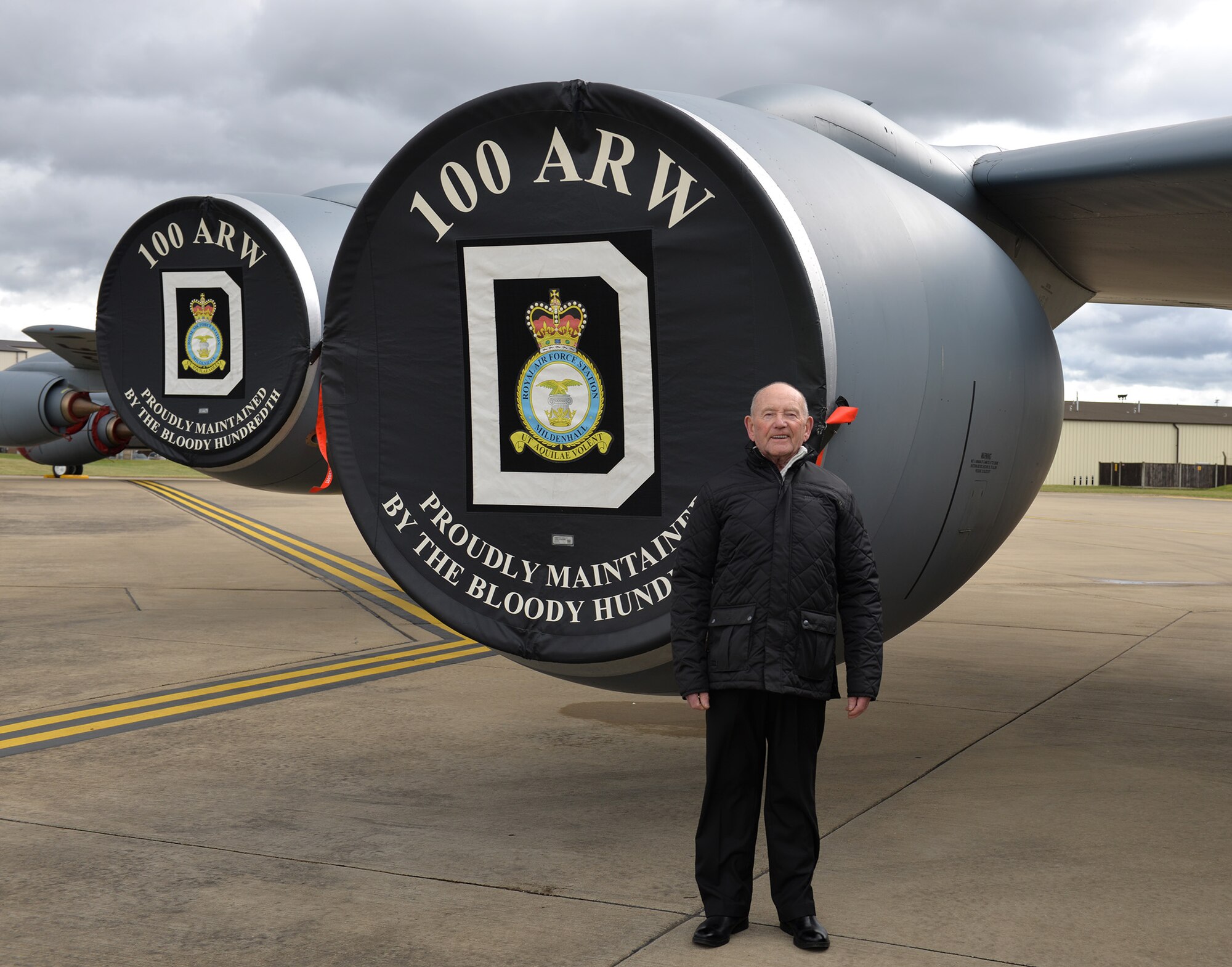 Tony Foulds poses for a photo by a KC-135 Stratotanker aircraft during a visit to Royal Air Force Mildenhall, England, March 15, 2019. Foulds visited RAF Mildenhall and RAF Lakenheath to thank the aircrew who participated in a flyover in Sheffield, England, in February 2019. The flyover was to mark the 75th anniversary of when a B-17 Flying Fortress, “Mi Amigo,” crashed during World War II, killing all 10 aircrew on board. Tony has dedicated his life to preserving the memorial built in honor of the crew who lost their lives. (U.S. Air Force photo by Karen Abeyasekere)