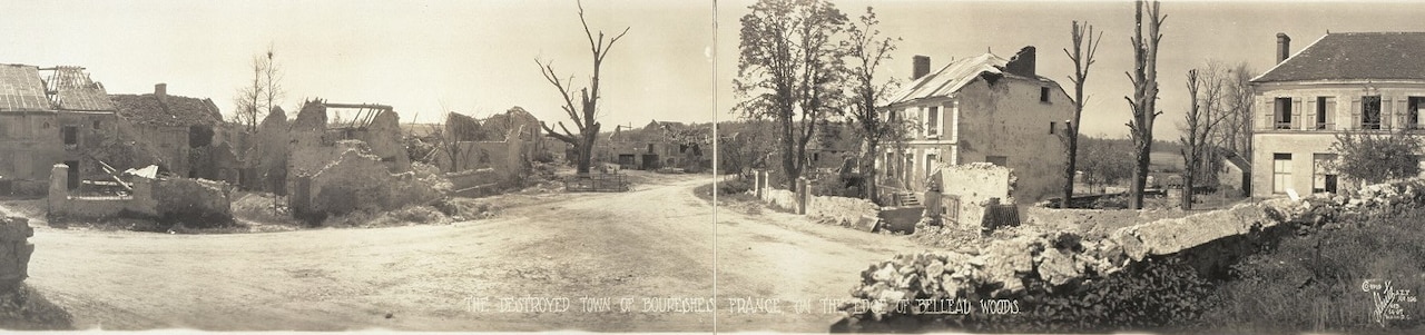 Rubble and two dilapidated houses are all that remains of a small town after World War I.