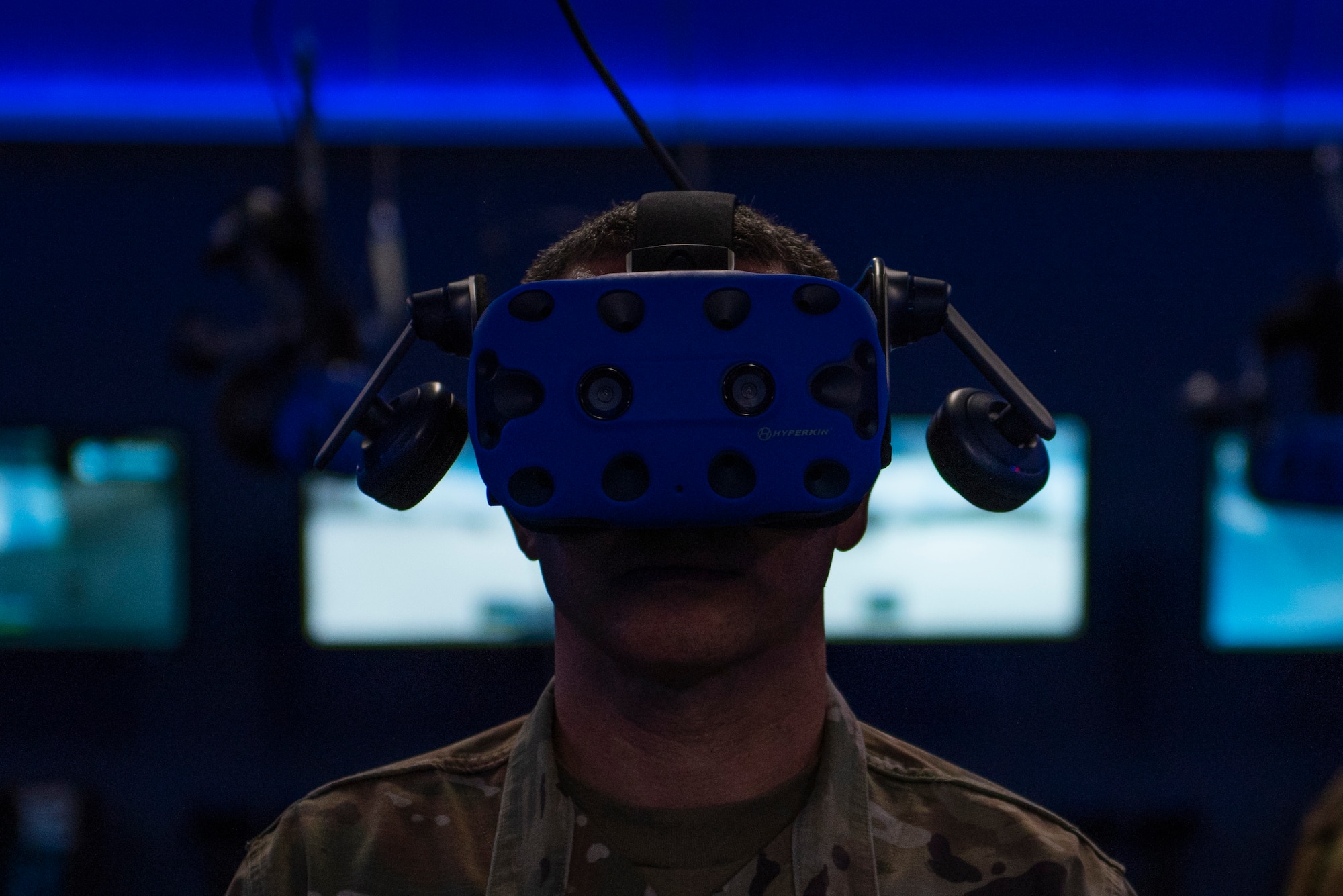 U.S. Air Force Chief Master Sgt. Brian Kruzelnick, Air Mobility Command command chief, uses virtual reality goggles during a 317th Maintenance Group capabilities briefing at Dyess Air Force Base, Texas, July 8, 2021. Airmen from the 317th MXG demonstrated the groups VR training capabilities and briefed the data gathered to the AMC command team. (U.S. Air Force photo by Senior Airman Colin Hollowell)