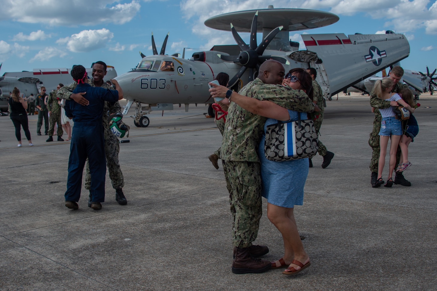 Families welcome home Sailors assigned to the “Rawhides” of Fleet Logistics Support (VRC) Squadron 40 on Naval Air Station (NAS) Oceana during the squadron’s homecoming. VRC-40,