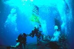 U.S. Navy SEALs conduct diving operations with the Virginia-class attack submarine USS New Mexico (SSN 779) during interoperability training in the Mediterranean Sea, June 28, 2021. This training demonstrated the ability for submarines to seamlessly integrate SEALs into Navy missions in the U.S. Sixth Fleet area of operations to ensure global access, security, and stability in the maritime domain. U.S. Sixth Fleet, headquartered in Naples, Italy, conducts the full spectrum of joint and naval operations, often in concert with allied, and interagency partners, in order to advance U.S. national interests and security and stability in Europe and Africa.