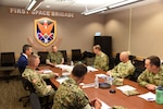 Marine and Army officials discuss training.