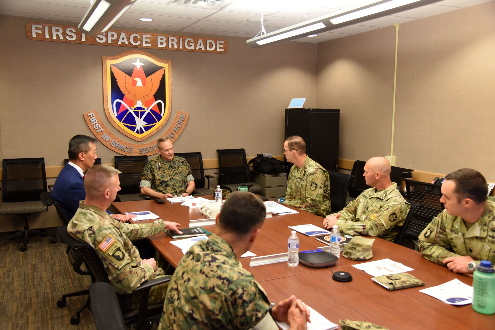 Marine and Army officials discuss training.