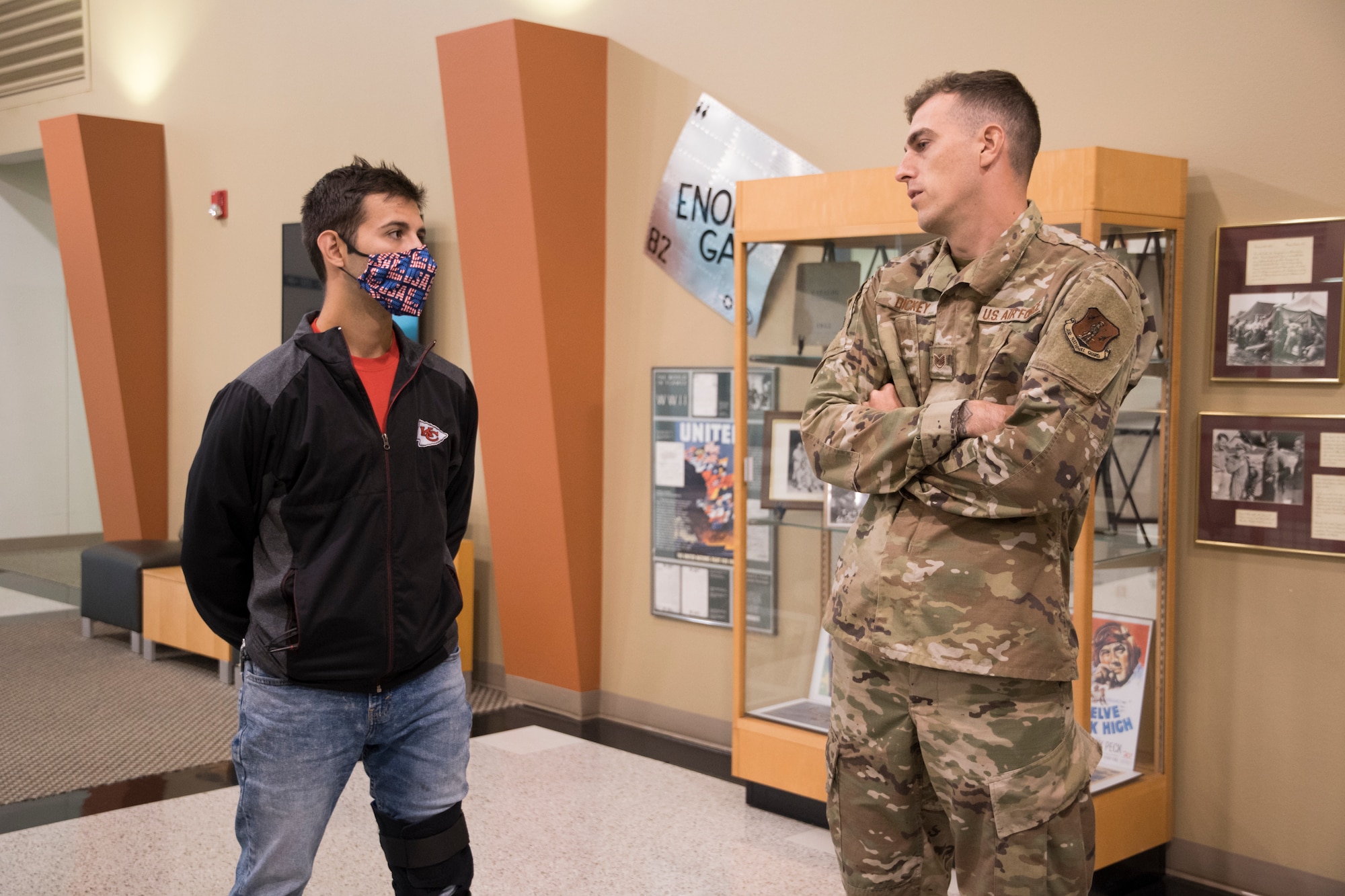 Missouri Air National Guard Staff Sgt. Ryan Dickey, a vehicle and vehicular maintenance technician for the 131st Bomb Wing, chats with David Rodriguez, a 131st Bomb Wing student flight member, July 10, 2021, at Whiteman Air Force Base, Missouri. Dickey is Rodriguez's sponsor while in student flight. (U.S. Air National Guard photo by Airman 1st Class Whitney Erhart)