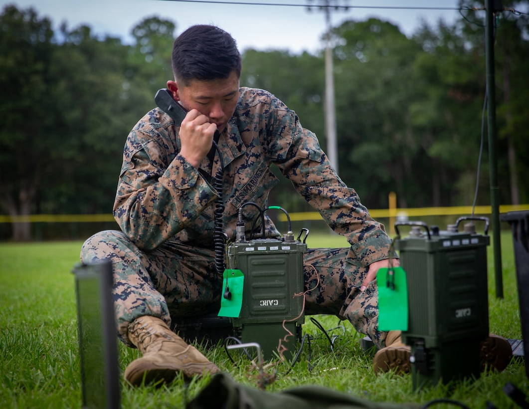 U.S. Marine Corps Cpl. Leo Yoon, a Rockville, Md., native and a transmissions systems operator with 1st Battalion, 2d Marine Regiment, 2d Marine Division (MARDIV), operates an AN/PRC-160(V) radio as part of the 2d MARDIV High-Frequency (HF) Competition on Naval Submarine Base Kings Bay, Ga., July 12, 2021. The competition enhanced HF transmission proficiency and capabilities to prepare Marines for future expeditionary conflicts where the area is either contested or degraded. (U.S. Marine Corps photo by Lance Cpl. Brian Bolin Jr.)