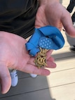 Boy hands holding Medal of Honor