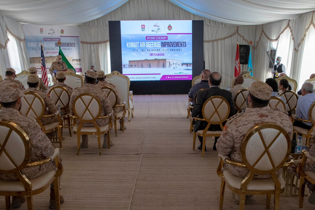 Kuwaiti and American service members and civilians celebrate the opening of the Patriot Fire Site, Site #7, Kuwait, July 5, 2021. The completed site provides a platform for a modernized, updated weapons system and an improved facility for the soldiers manning it.