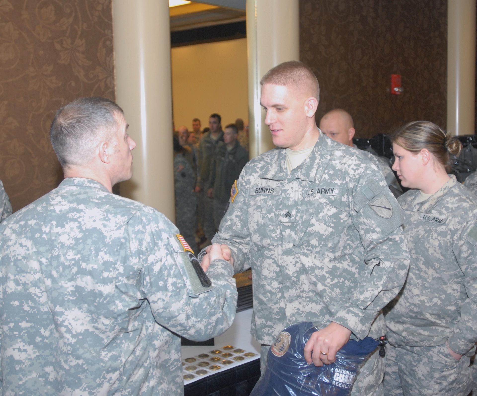 More than 30 Kentucky National Guardsmen reenlisted following a retention symposium at the Galt House.