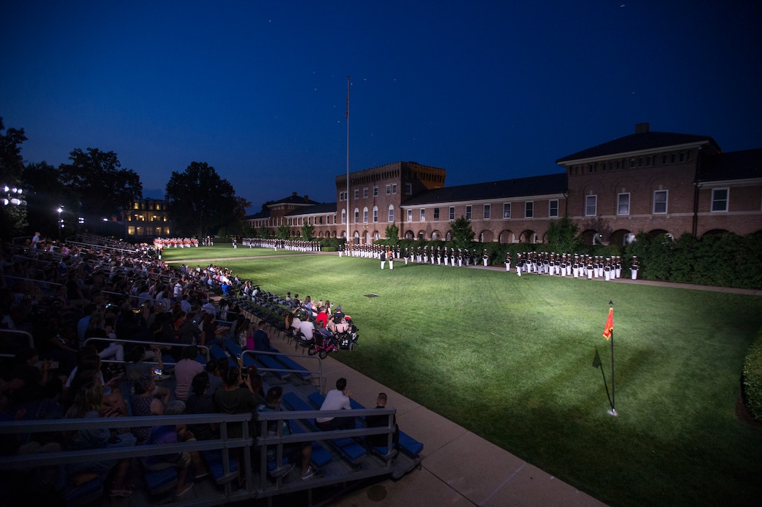 Marines with Marine Barracks Washington stand in formation during the Friday Evening Parade at MBW, July 9, 2021