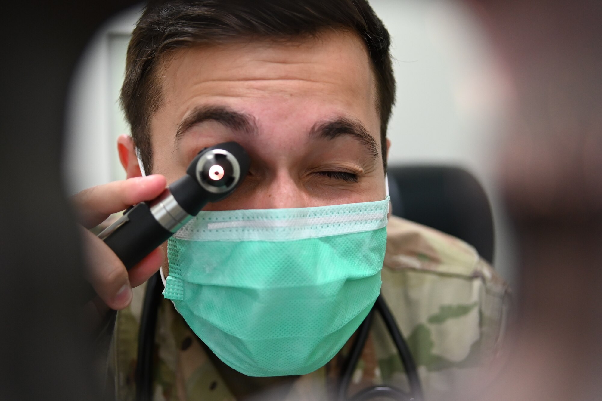 Staff Sgt. Jon Paul Fitzgerald, 336th Fighter Squadron independent duty medical technician, uses an otoscope at Seymour Johnson Air Force Base, North Carolina, July 13, 2021. An otoscope is used to inspect a patient’s outer ear canal and eardrum. (U.S. Air Force Photo by Airman 1st Class David Lynn)