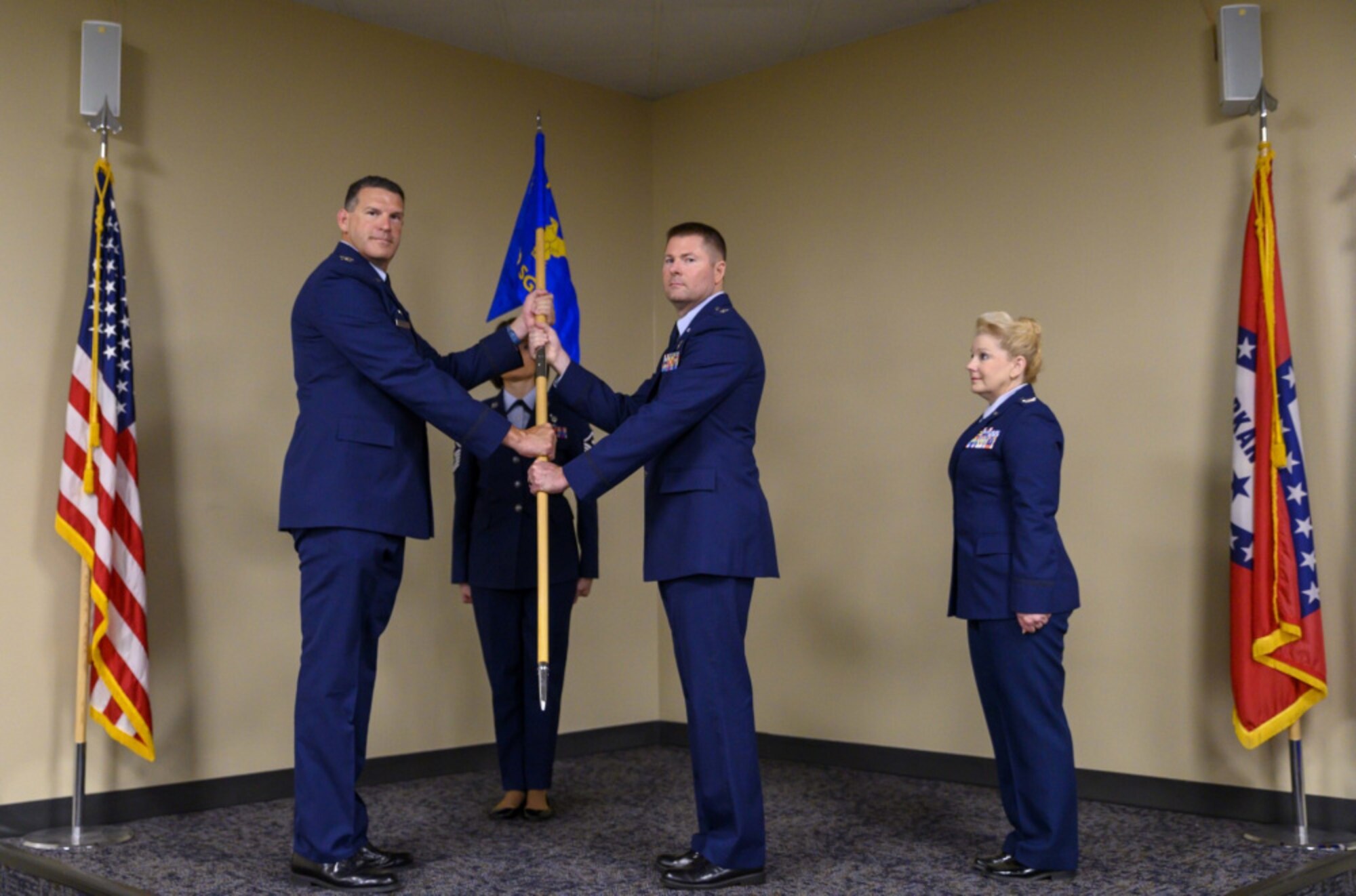 188th Wing Commander Col. Leon Dodroe passes the Mission Support Group guidon to Lt. Col. Dillon Patterson.