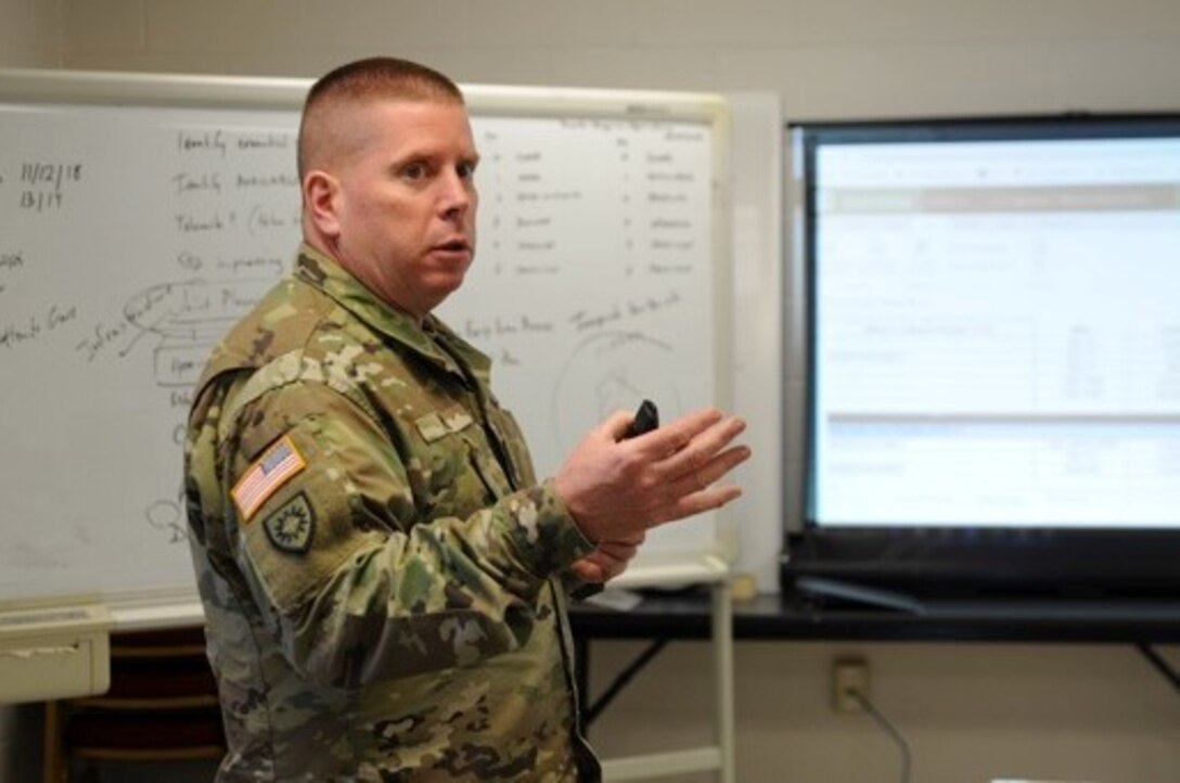 Maj. John Rock conducts planning operations at Boone National Guard Center in Frankfort, Ky.