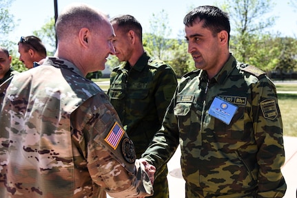 Brig. Gen. James Ring, Virginia National Guard Director of the Joint Staff, and Col. Todd Hubbard, VNG Operations Chief, visit  Regional Cooperation 2021, a U.S. Central Command-led exercise designed to promote cooperation among the U.S and partner nations in Central and South Asia, June 14, 2021, in Helena, Montana. Fifteen Virginia Soldiers participated in the event and were integrated in various staff positions and used the opportunity to strengthen their relationship with their state partners from Tajikistan. (U.S. Army National Guard photo by Sgt. 1st Class Terra C. Gatti)