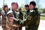 Brig. Gen. James Ring, Virginia National Guard Director of the Joint Staff, and Col. Todd Hubbard, VNG Operations Chief, visit  Regional Cooperation 2021, a U.S. Central Command-led exercise designed to promote cooperation among the U.S and partner nations in Central and South Asia, June 14, 2021, in Helena, Montana. Fifteen Virginia Soldiers participated in the event and were integrated in various staff positions and used the opportunity to strengthen their relationship with their state partners from Tajikistan. (U.S. Army National Guard photo by Sgt. 1st Class Terra C. Gatti)