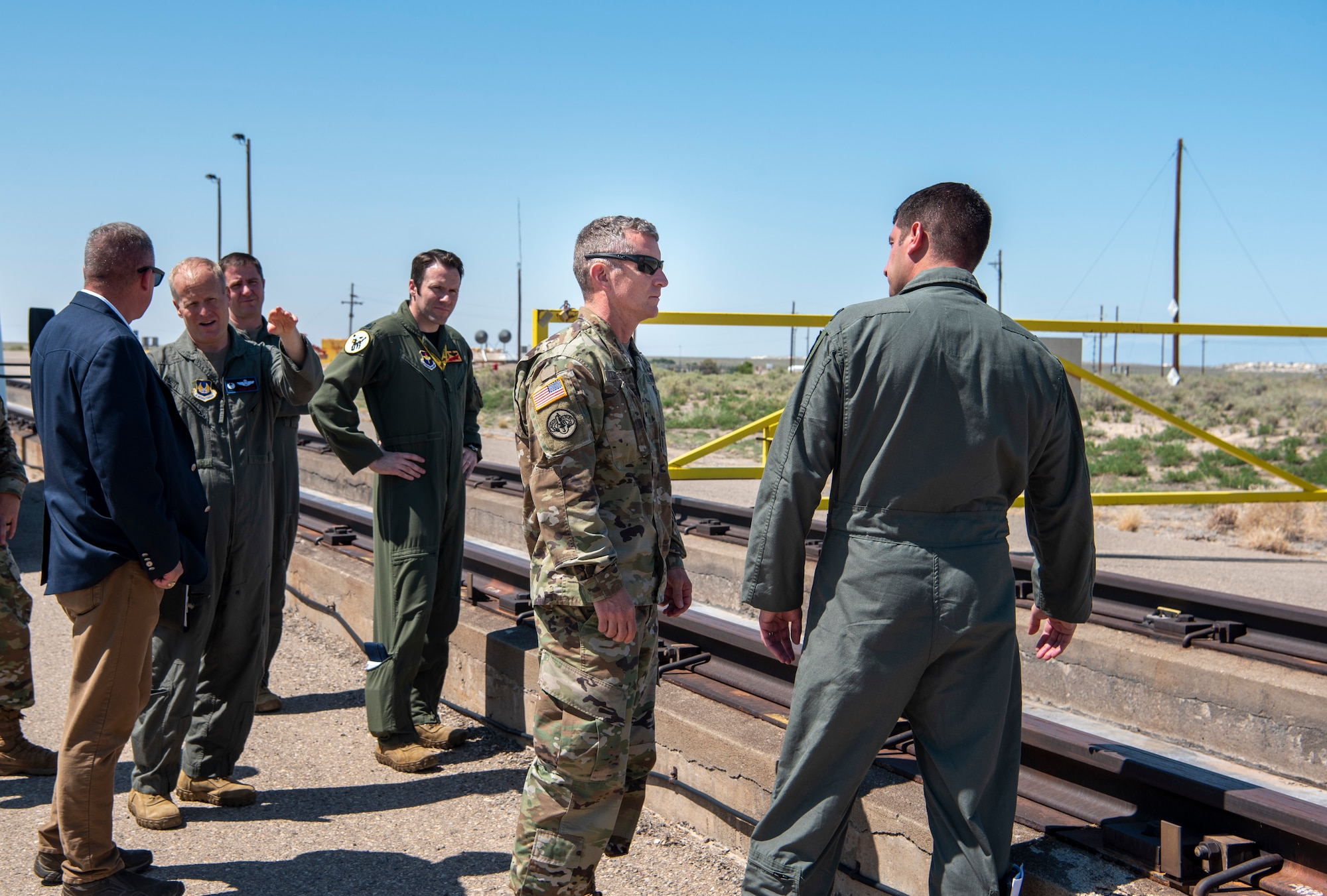 U.S. Army Brig. Gen. Eric Little, White Sands Missile Range commander, visits the 704th Test Group high speed test track, July 9, 2021, on Holloman Air Force Base, New Mexico. Little visited Holloman AFB to familiarize with local operations and tour partner units. (U.S. Air Force photo by Airman 1st Class Jessica Sanchez)