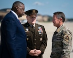 Defense Secretary Lloyd Austin and Army Gen. Mark A. Milley, chairman of the Joint Chiefs of Staff, meet Army Gen. Scott Miller at Joint Base Andrews, Md., upon his return home from Afghanistan after relinquishing command of U.S. and NATO Resolute Support Mission, July 14, 2021. Miller relinquished command July 12, 2021 as the U.S. reduces the military presence in Afghanistan. (DOD Photo by Navy Petty Officer 1st Class Carlos M. Vazquez II)