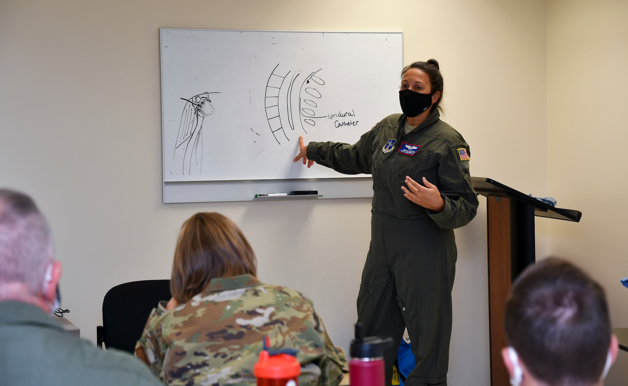 Master Sgt. Megan Clifton, an aeromedical evacuation technician assigned to the 183rd Aeromedical Evacuation Squadron, teaches a class on how to properly insert an epidural at Keesler Air Force Base in Biloxi, Mississippi, July 22, 2020. The 183rd AES participated in a variety of training that consisted of classroom lessons, simulated hospital patient care and simulated inflight patient care. (U.S. Air National Guard Photo by Maj. Reagan Lauritzen)