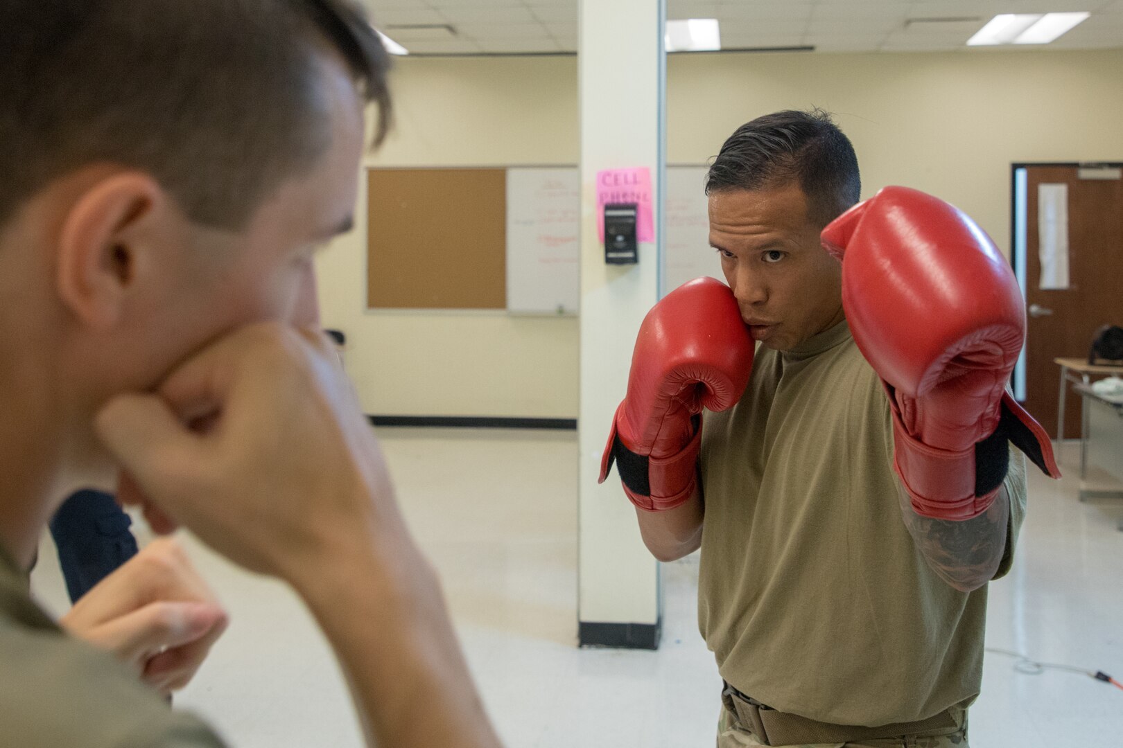 Capt. Adrian Mateos, officer in charge of Delta Wellness Innovative Readiness Training, teaches a class on “combatives” July 10, 2021. Mateos was responsible for the entire training program during the two-week IRT.