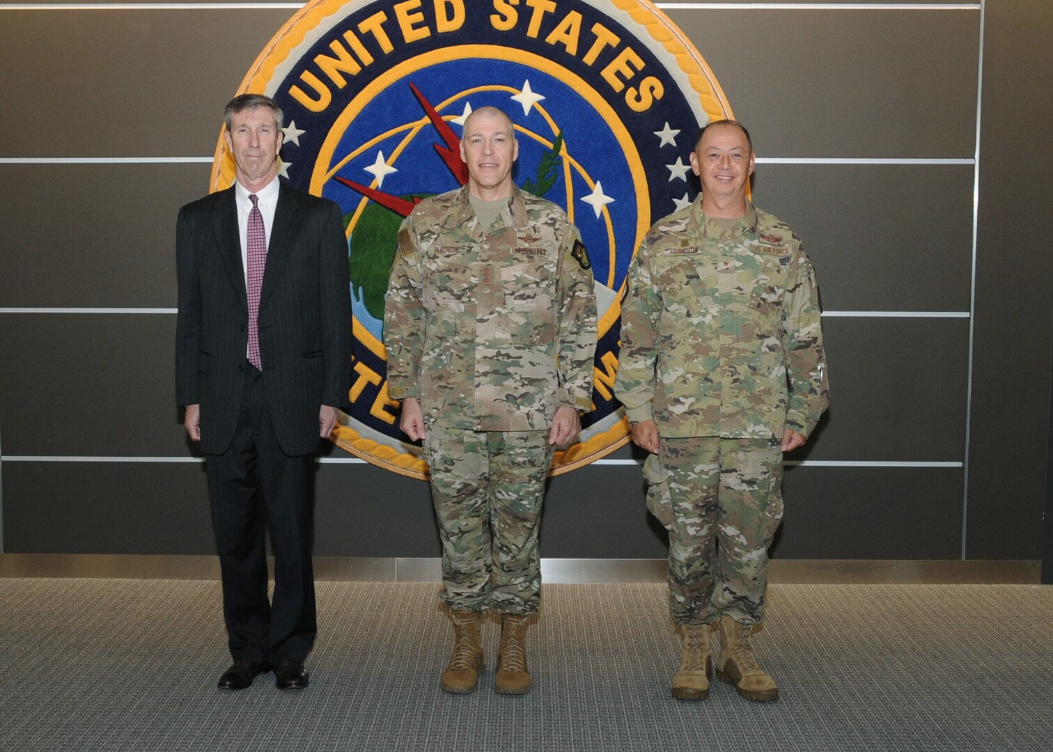 Dr Rhys Williamd Action Director, Defense Threat Reduction Agency, is greeted by LTG Bussier Deputy Commander, USSTRATCOM,