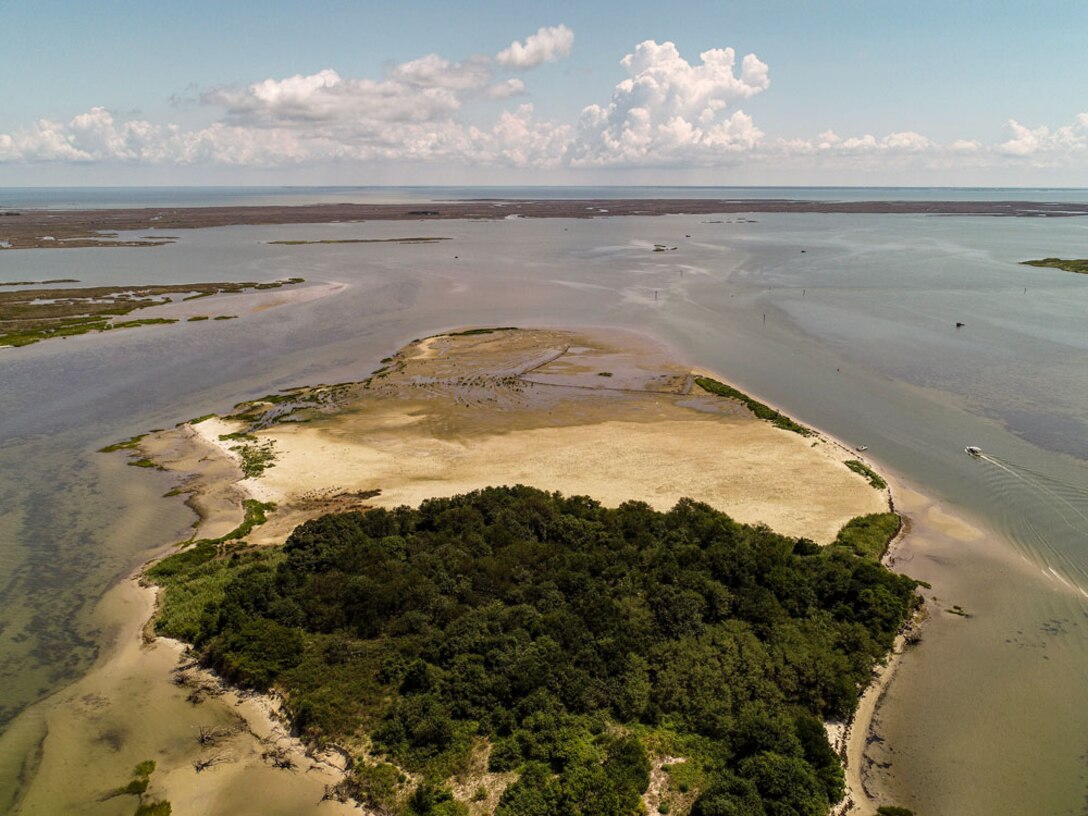 An aerial photograph shows a portion of Swan Island in the Chesapeake Bay in Maryland. Swan Island is an example of an island restored through beneficially used dredged sediment. In 2018, the U.S. Army Corps of Engineers, as part of the Engineering With Nature® initiative, along with the National Oceanic and Atmospheric Administration (NOAA), dedicated resources to monitor the island to better understand the ecological and engineering performance of the project.