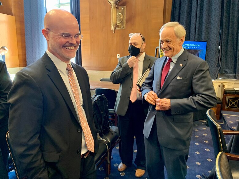 U.S. Army Corps of Engineers’ Senior Research Scientist and lead of USACE’s Engineering With Nature® (EWN) initiative, left, meets with U.S. Sen.  Tom Carper (D-Del.) before Bridges’ testimony before the Senate’s Committee on Environment and Public Works on June 24, 2021.