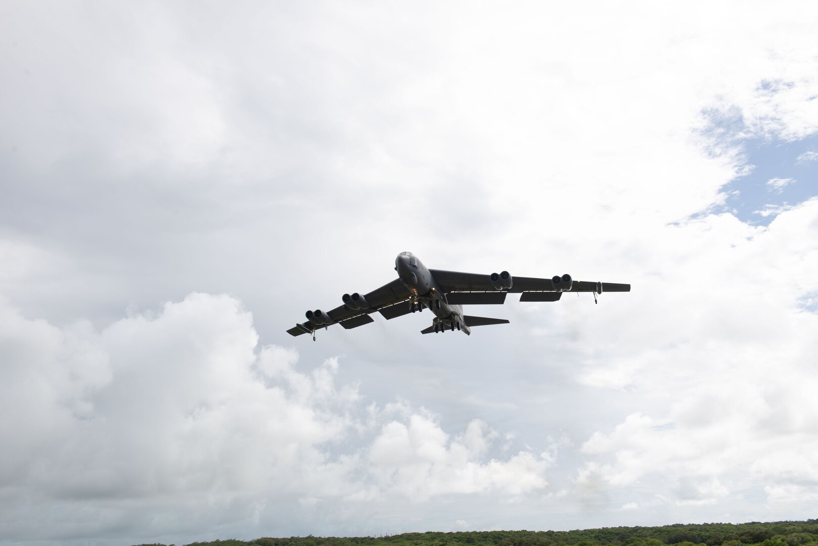 U.S. Air Force B-52H Stratofortress from the 5th Bomb Wing, Minot Air Force Base North Dakota, prepares to land at Andersen Air Force Base, Guam, for a Bomber Task Force deployment, July 15, 2021. Bomber Task Force missions demonstrate the strategic credibility and tactical flexibility of U.S. forces in today's security environment across the globe. (U.S. Air Force photo by SSgt Nicholas Crisp)