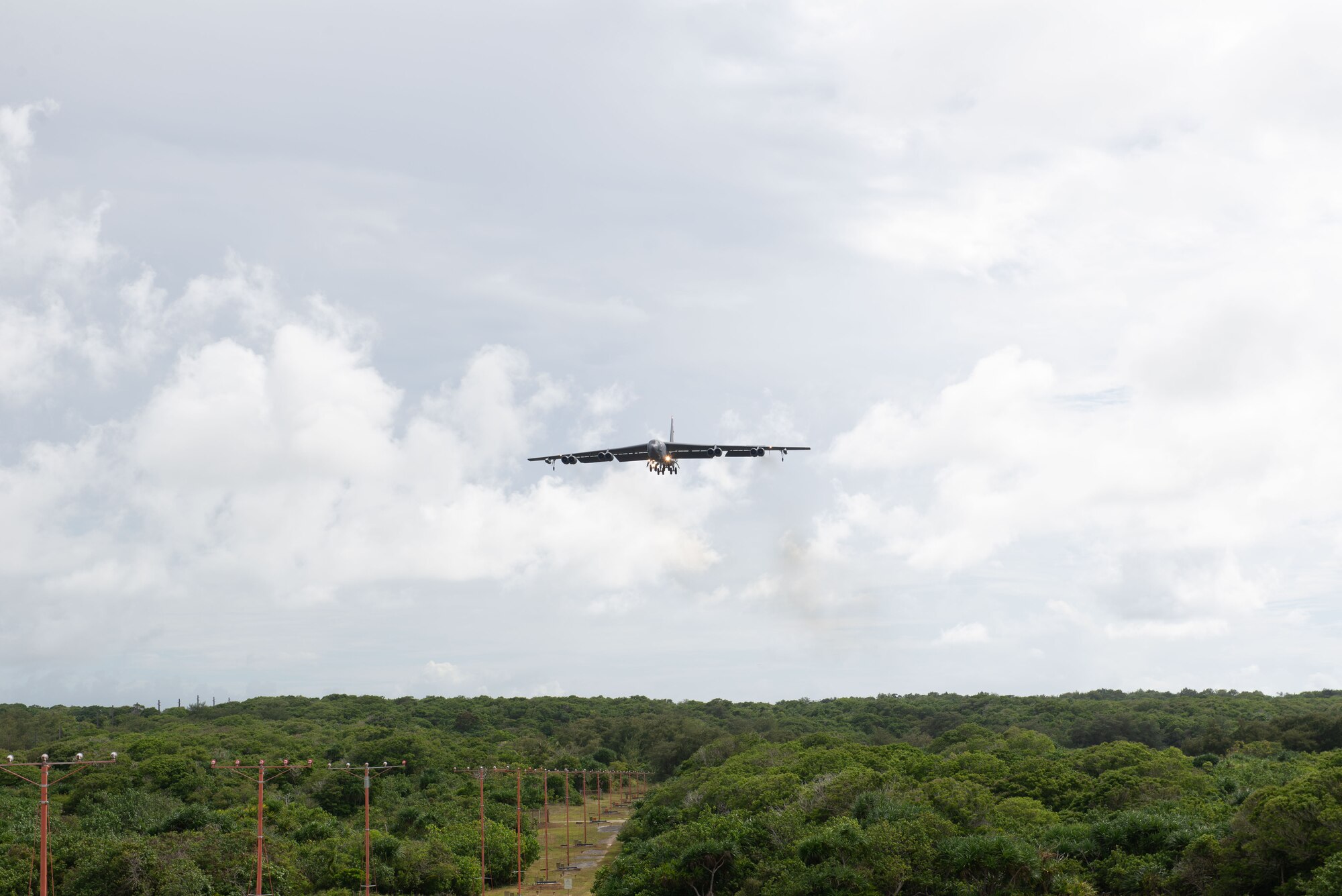 U.S. Air Force B-52H Stratofortress from the 5th Bomb Wing, Minot Air Force Base North Dakota, prepares to land at Andersen Air Force Base, Guam, for a Bomber Task Force deployment, July 15, 2021. Bomber Task Force missions demonstrate the strategic credibility and tactical flexibility of U.S. forces in today's security environment across the globe. (U.S. Air Force photo by SSgt Nicholas Crisp)